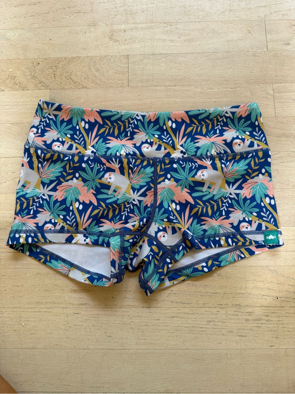 Navy Sloth-Print Athletic Shorts with Tropical Leaf Pattern